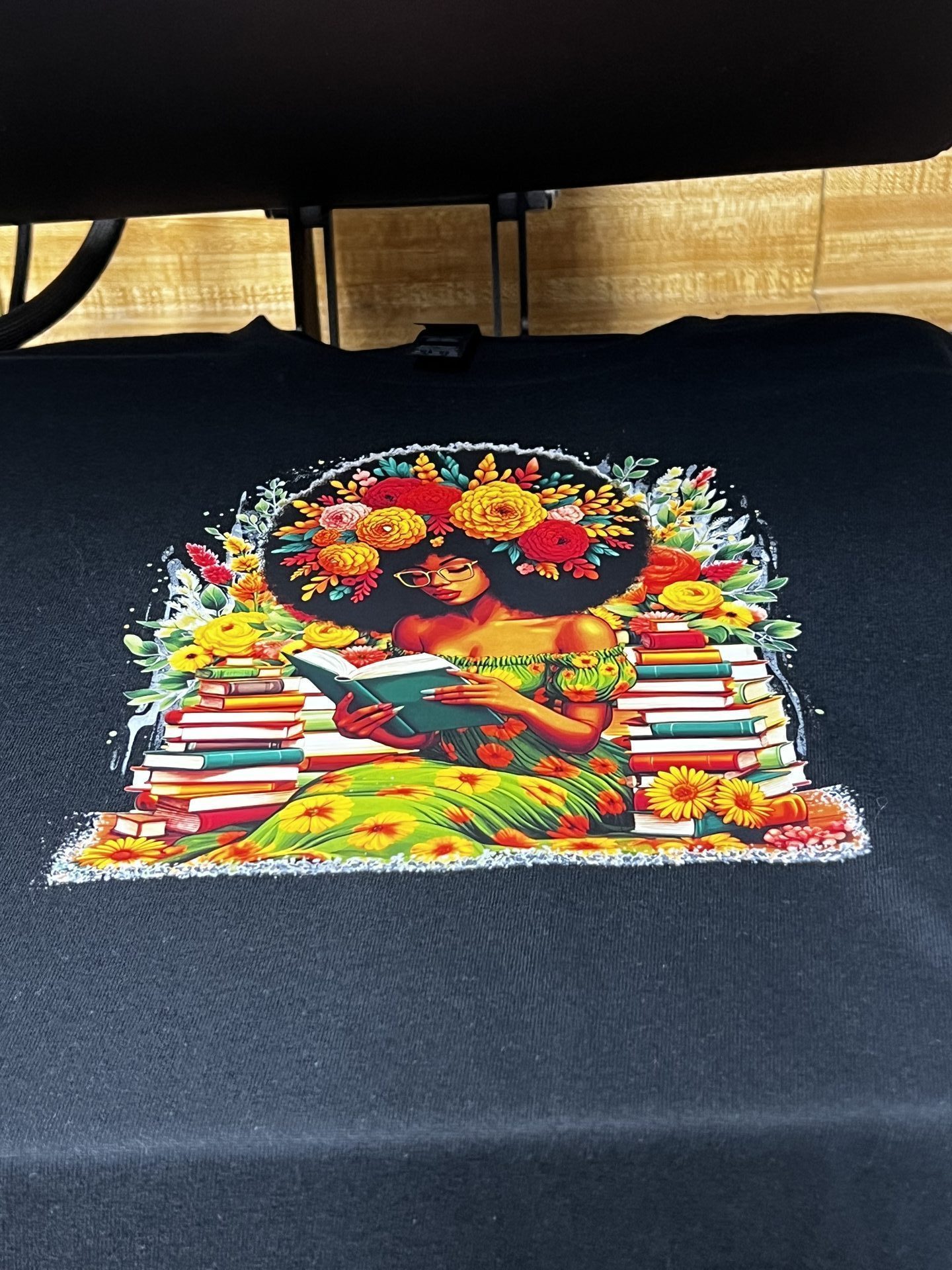 Custom black shirt with Black queen afro floral artwork and book design