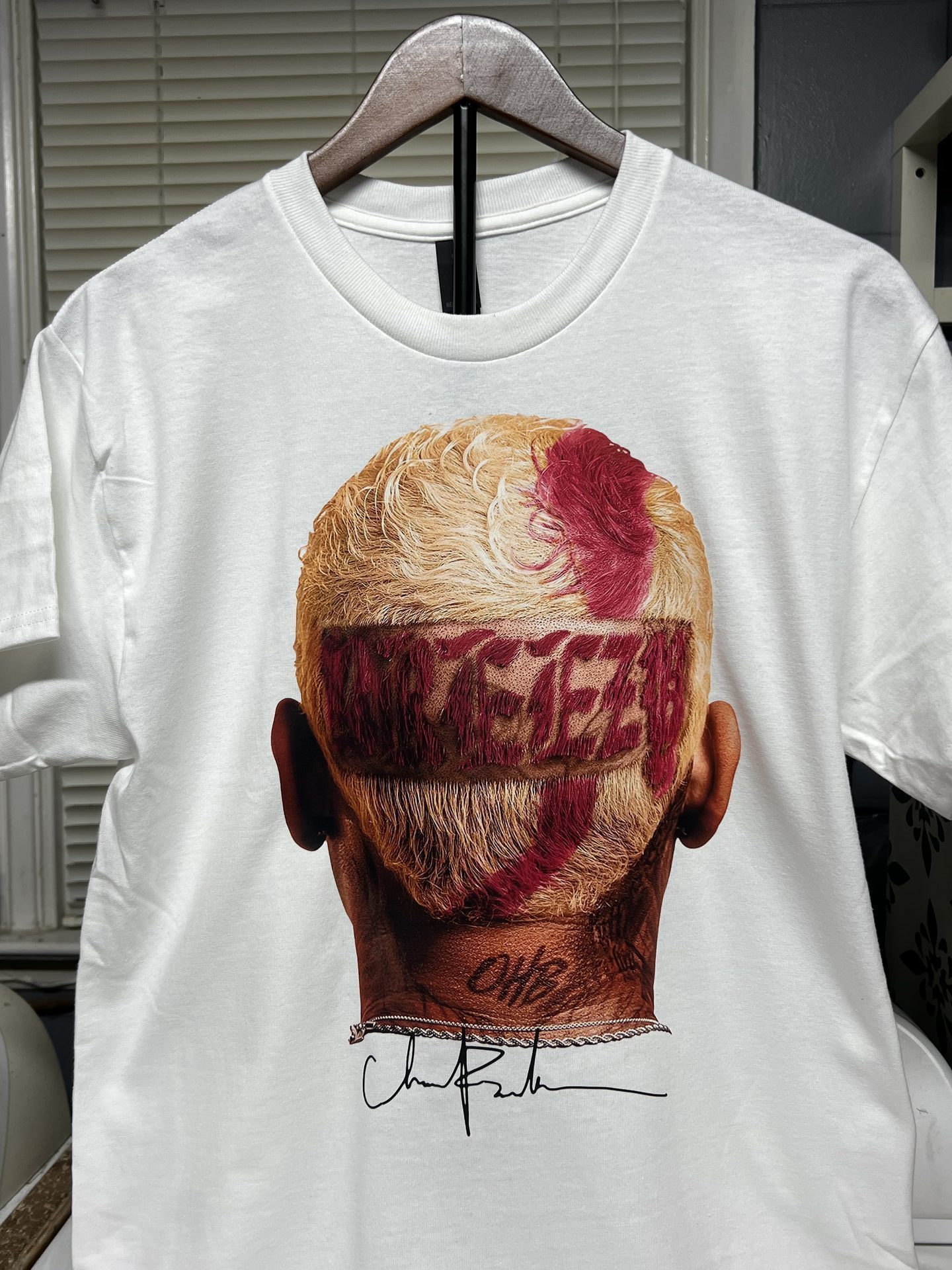 Custom white shirt with detailed Chris Brown head portrait artwork