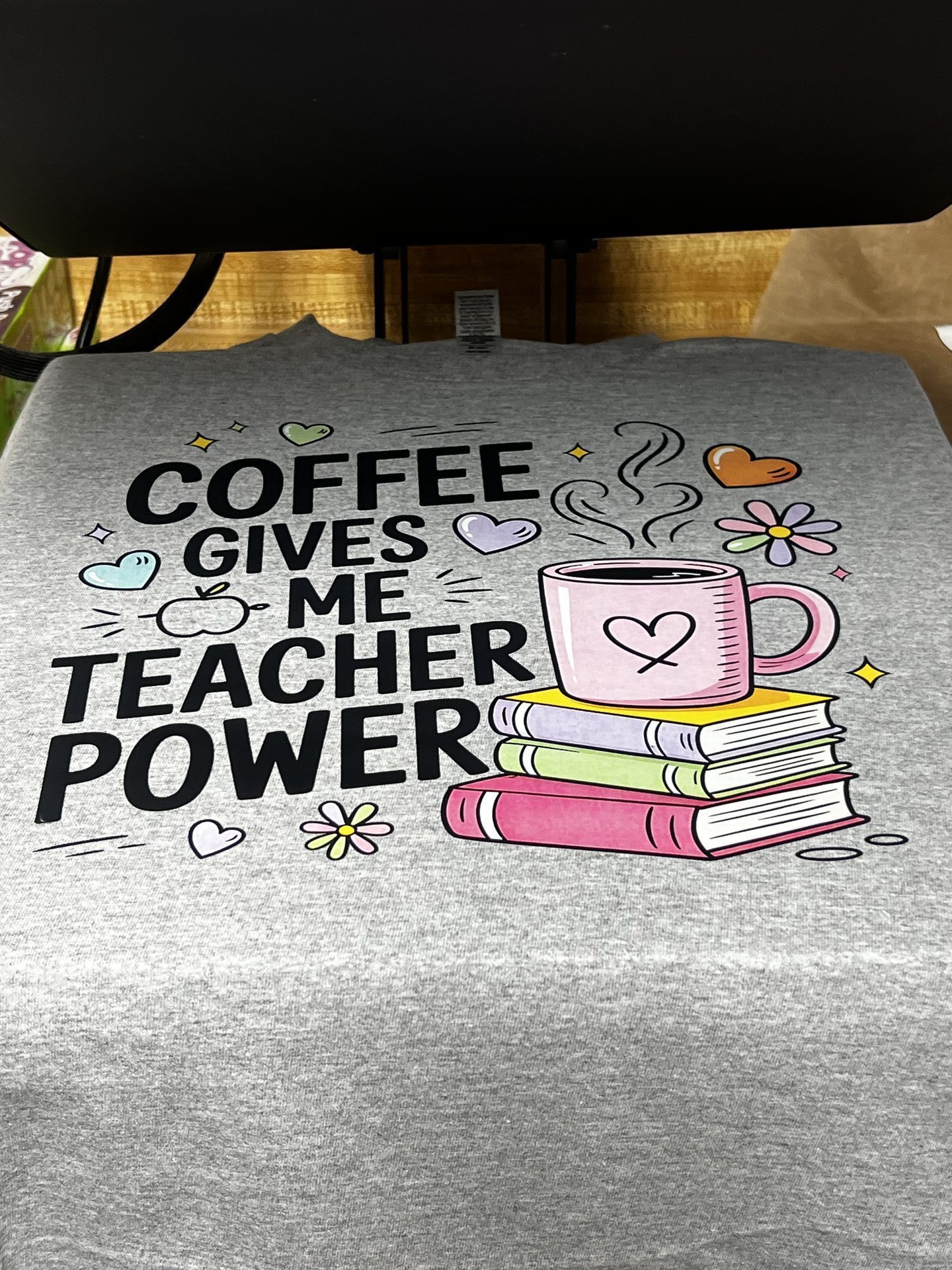 Custom gray shirt reading Coffee Gives Me Teacher Power with book and lock design