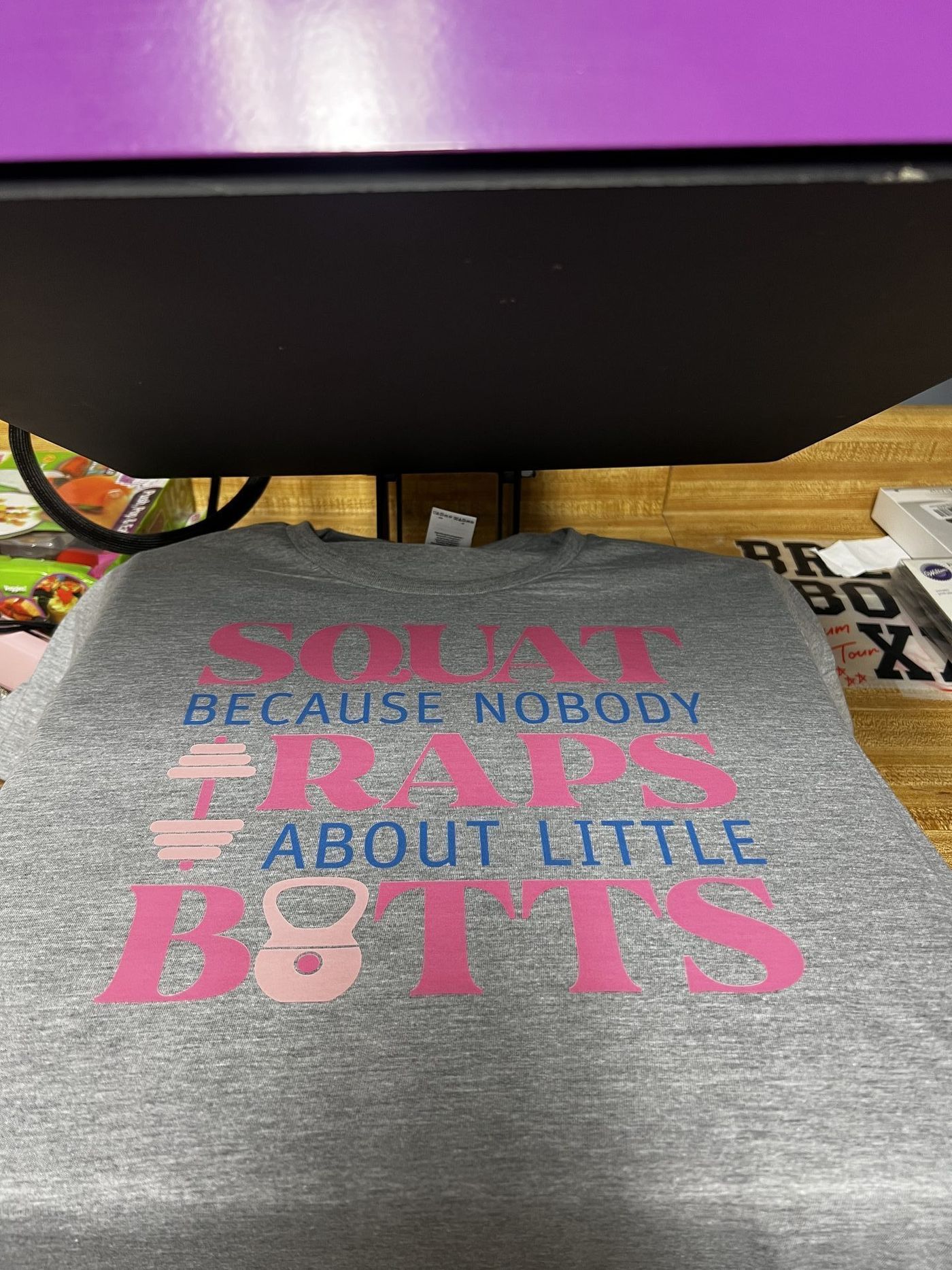 Custom gray fitness graphic shirt with pink and blue typography